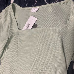 Mint color bodysuit. Never worn. New with tags